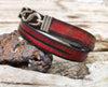 Red bracelet with black wash and silver clasp