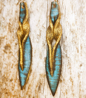 Handmade turquoise leather earing with brown wash and gold, you can wear it in both size, you get two beautiful earings in one.