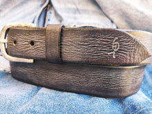 A brown leather  Ishaor belt with gray patina the perfect color  The color combination creates a belt that matches any outfit the best gift.