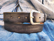 A brown leather  Ishaor belt with gray patina the perfect color  The color combination creates a belt that matches any outfit the best gift.