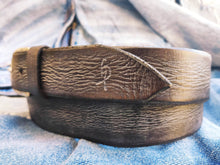 A brown leather  Ishaor belt with gray patina the perfect color  The color combination creates a belt that matches any outfit the best gift.