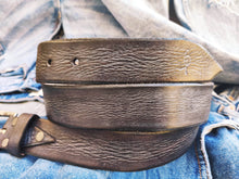 A brown leather  Ishaor belt with gray patina the perfect color  The color combination creates a belt that matches any outfit the best gift.