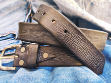 A brown leather  Ishaor belt with gray patina the perfect color  The color combination creates a belt that matches any outfit the best gift.