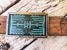 a Ishaor original rectangle buckle with turquoise leather embossing with heat sink cooler & brown wash stunning buckle that upgrade any belt