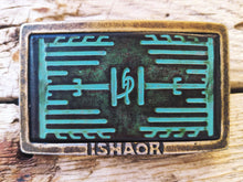 a Ishaor original rectangle buckle with turquoise leather embossing with heat sink cooler & brown wash stunning buckle that upgrade any belt