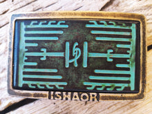 a Ishaor original rectangle buckle with turquoise leather embossing with heat sink cooler & brown wash stunning buckle that upgrade any belt