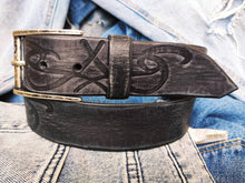 A black leather belt decorated with ishaor tribal unique handmade leather belt by ishaor ,perfect gift for men that love unique products