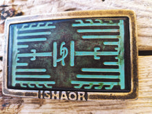 a Ishaor original rectangle buckle with turquoise leather embossing with heat sink cooler & brown wash stunning buckle that upgrade any belt