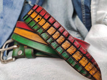 Leather belt designed in African colors, red, yellow and green with a brown wash and belt tail with a crocodile texture