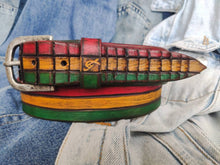 Leather belt designed in African colors, red, yellow and green with a brown wash and belt tail with a crocodile texture