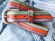 A colorful and summery belt made from three layers of pastel colors orange turquoise and purple  fits with jeans and refreshes any outfit