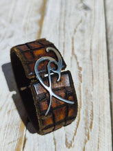 Handcrafted Crocodile-Textured Brown Leather Bracelet with Silver Ishaor Logo Closure