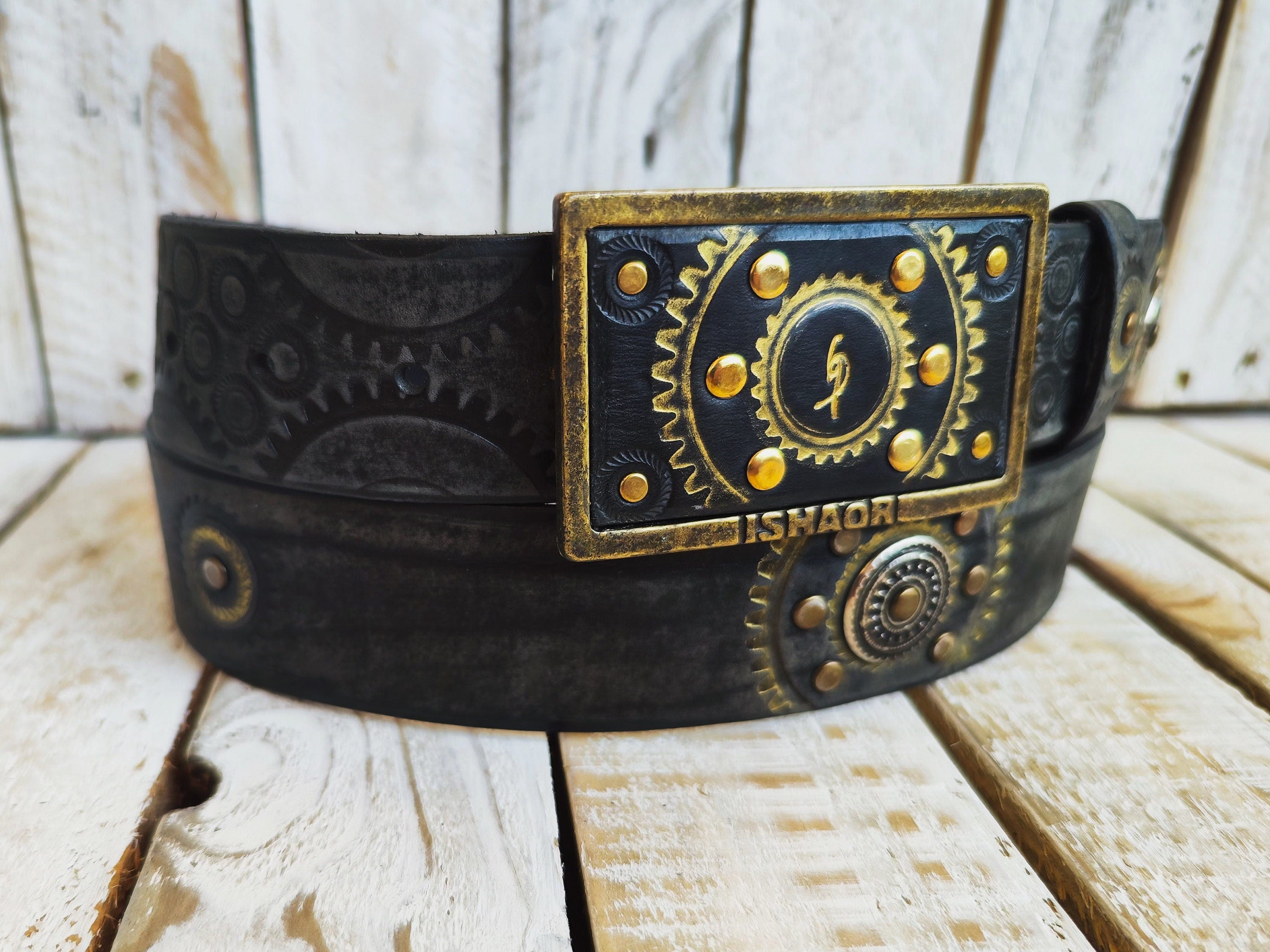 Handcrafted Black Leather Belt with Motorcycle Gear Stamps, Silver Studs, and touch of gold with silver rings and matching buckle.