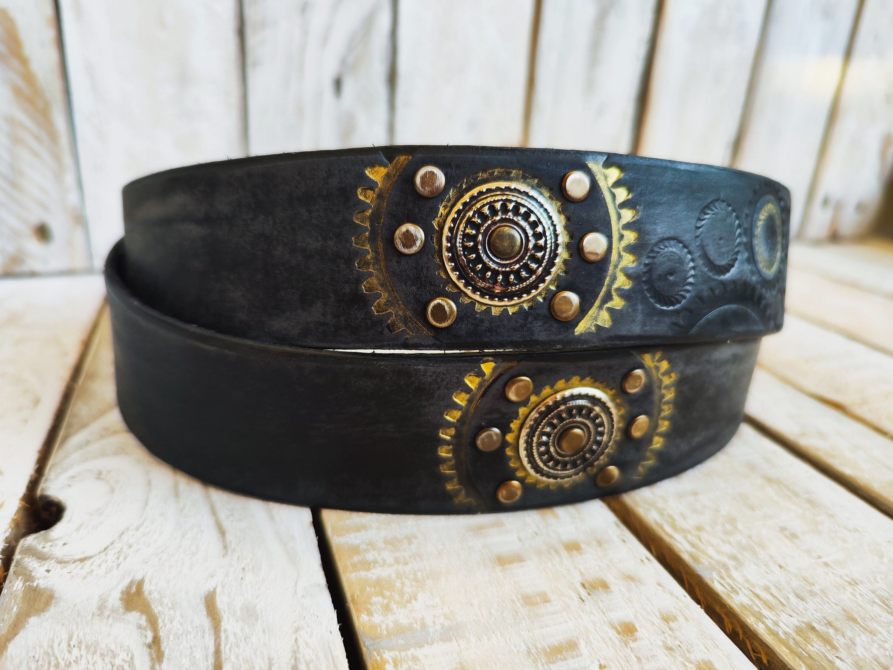 Handcrafted Black Leather Belt with Motorcycle Gear Stamps, Silver Studs, and touch of gold with silver rings and matching buckle.