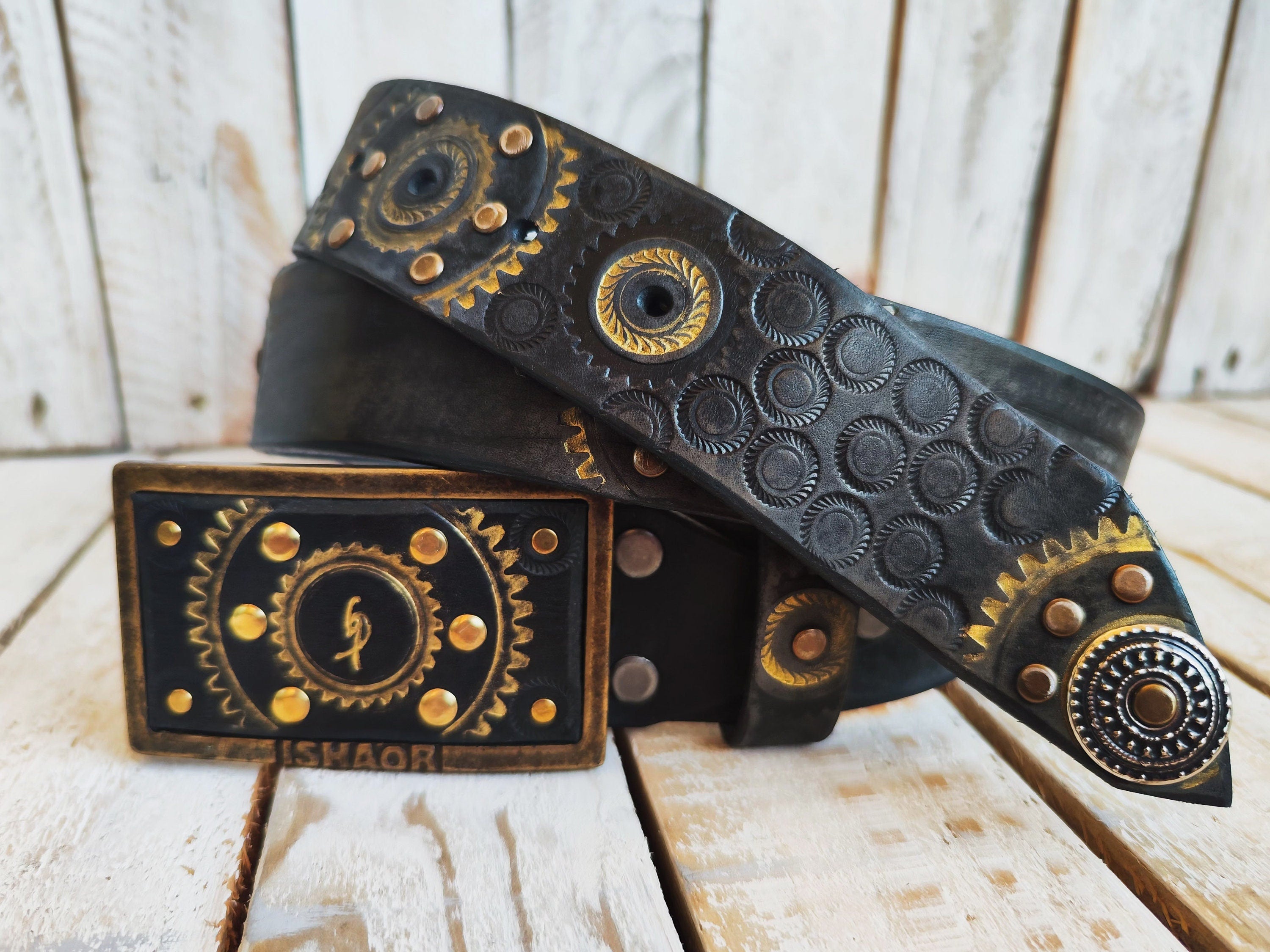 Handcrafted Black Leather Belt with Motorcycle Gear Stamps, Silver Studs, and touch of gold with silver rings and matching buckle.