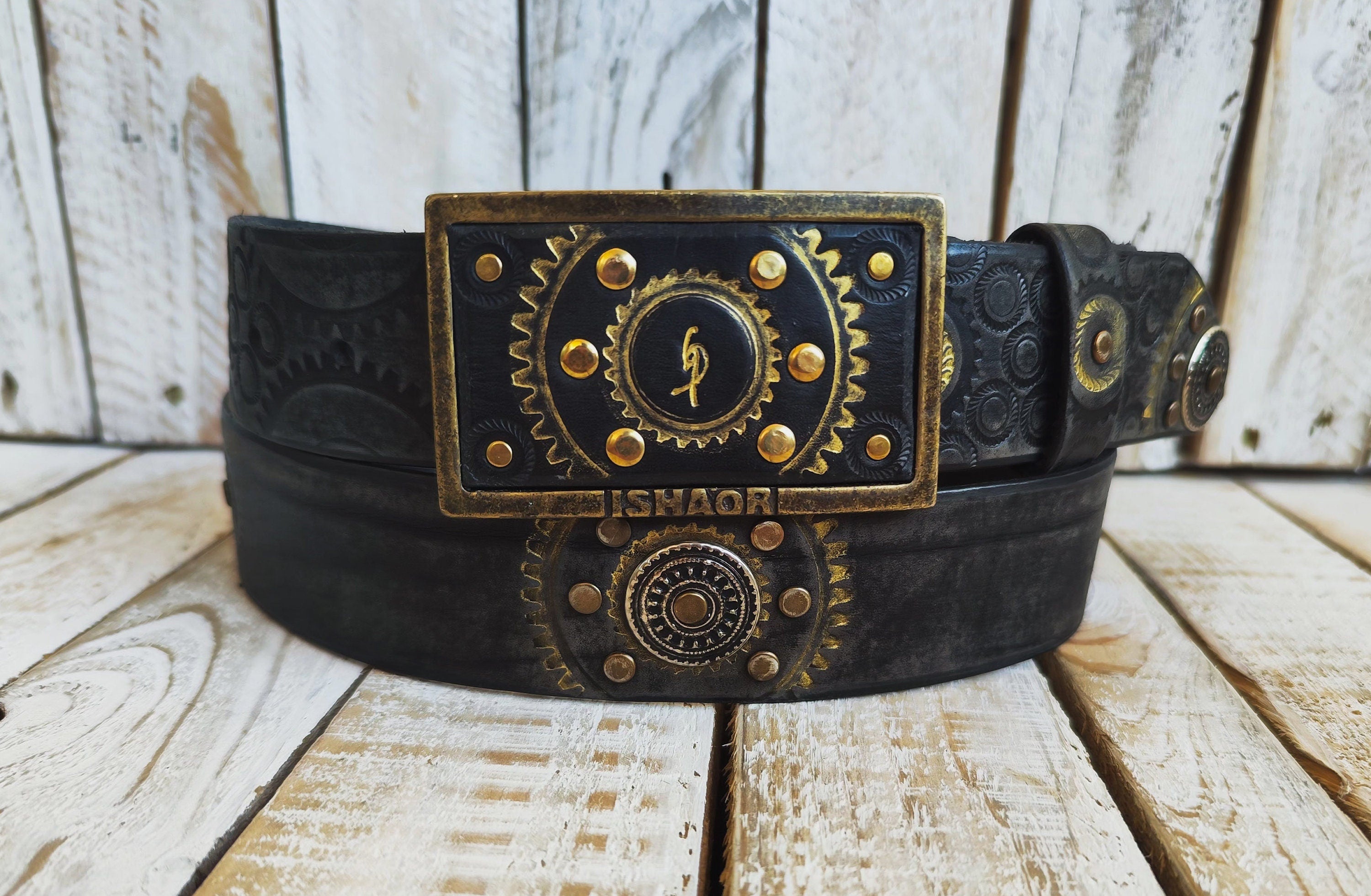 Handcrafted Black Leather Belt with Motorcycle Gear Stamps, Silver Studs, and touch of gold with silver rings and matching buckle.