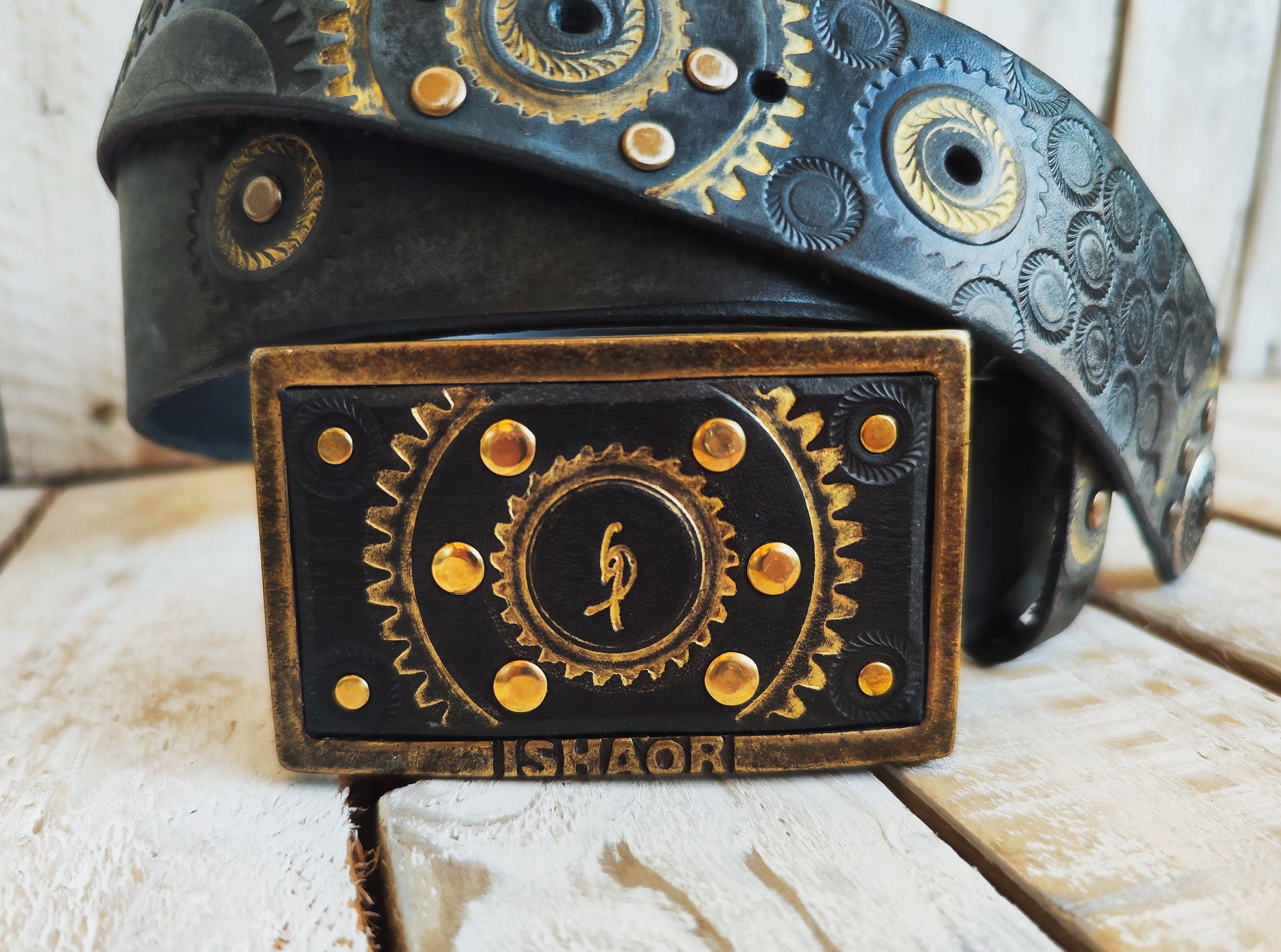 Handcrafted Black Leather Belt with Motorcycle Gear Stamps, Silver Studs, and touch of gold with silver rings and matching buckle.