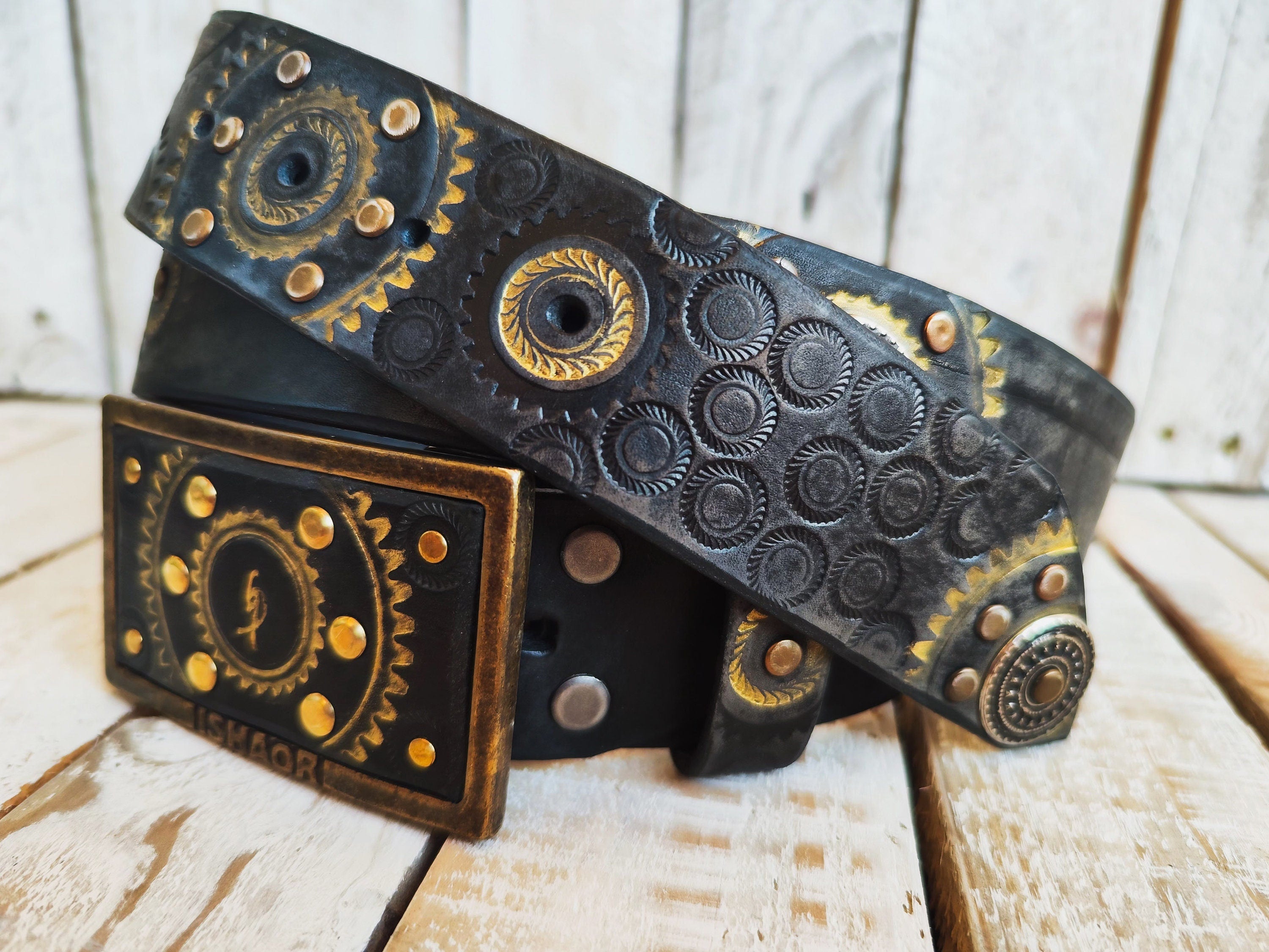 Handcrafted Black Leather Belt with Motorcycle Gear Stamps, Silver Studs, and touch of gold with silver rings and matching buckle.