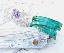 Handmade Turquoise Leather Bracelet with  greenWash and touch of gold decorate with Elegant Gold pieces