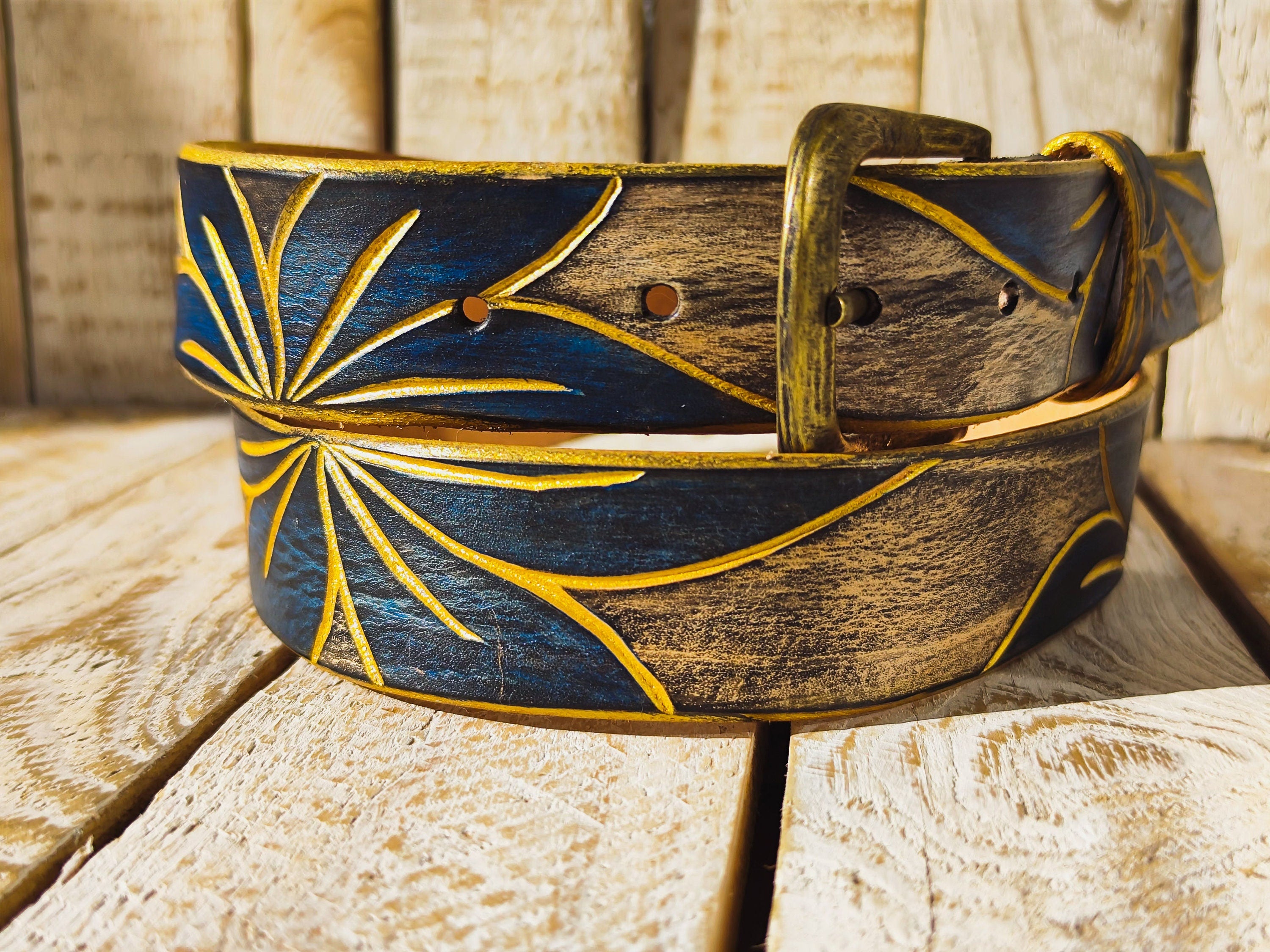 Artisanal White Leather Belt with Engraved Blue Flower Design, Black Wash Finish, and Gilded Details