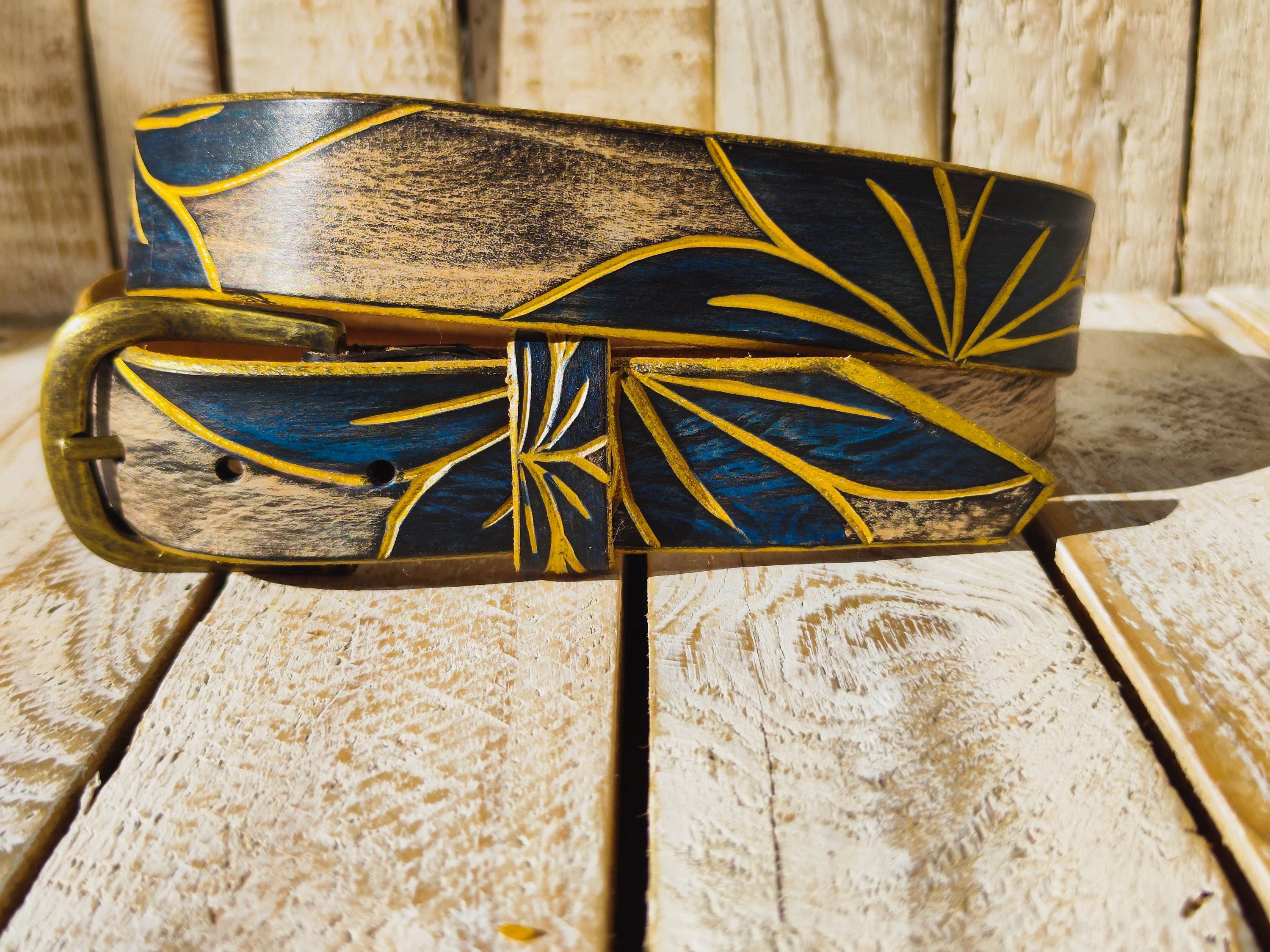 Artisanal White Leather Belt with Engraved Blue Flower Design, Black Wash Finish, and Gilded Details