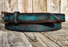 Distressed Turquoise Narrow Leather Belt for men and women with a silver buckle.A Statement Piece for Your Jeans Stunning rough finish.