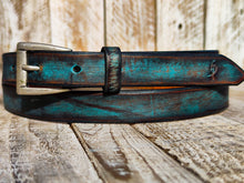 Distressed Turquoise Narrow Leather Belt for men and women with a silver buckle.A Statement Piece for Your Jeans Stunning rough finish.